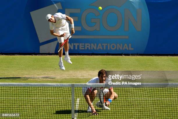 Great Britain's Jamie Murray and the USA's Eric Butorac in action against Italy's Daniele Bracciali and Andreas Seppi during day two of the AEGON...