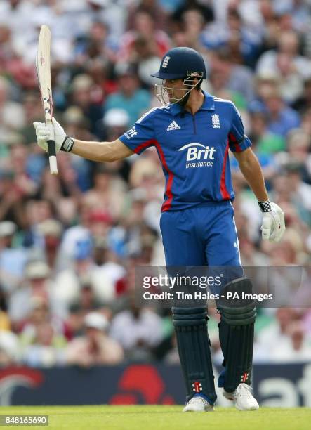 England's Alastair Cook reacts after reaching his half centaury during the One Day International match at the Kia Oval, London.
