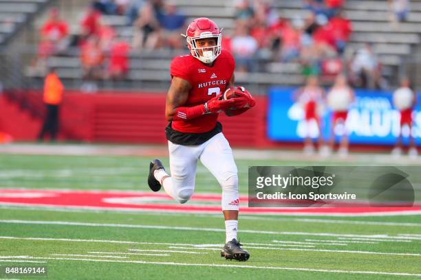 Rutgers Scarlet Knights defensive back Kiy Hester returns an interception during the NCAA Football game between the Rutgers Scarlet Knights and the...