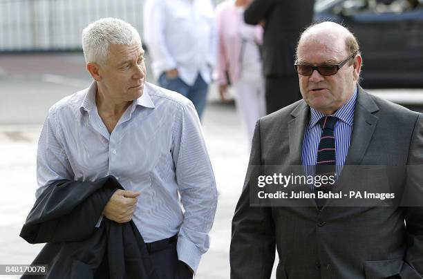 Bass guitarist Adam Clayton arrive swith U2 manager Paul McGuinness at Dublin Circuit Criminal Court, where his former personal assistant, Carol...