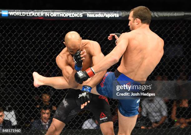 Luke Rockhold kicks David Branch in their middleweight bout during the UFC Fight Night event inside the PPG Paints Arena on September 16, 2017 in...