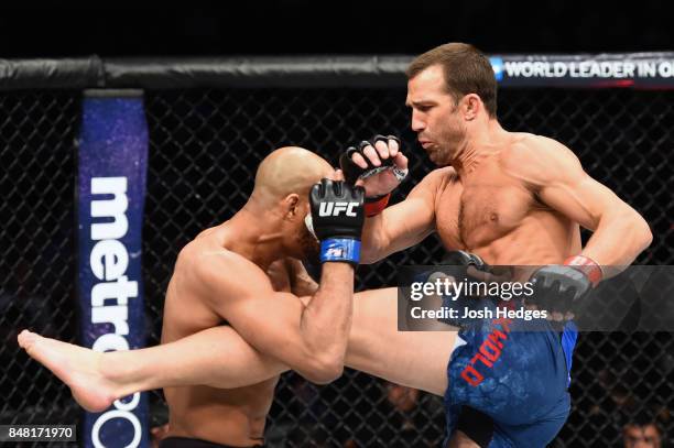 Luke Rockhold kicks David Branch in their middleweight bout during the UFC Fight Night event inside the PPG Paints Arena on September 16, 2017 in...