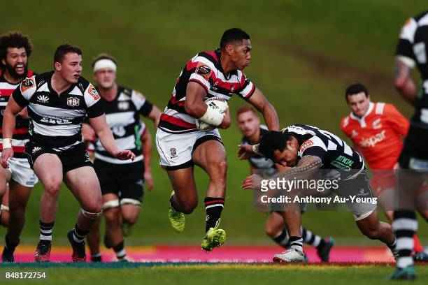 Nigel Ah Wong of Counties Manukau fends off a tackle during the round five Mitre 10 Cup match between Counties Manukau and Hawke's Bay at ECOLight...