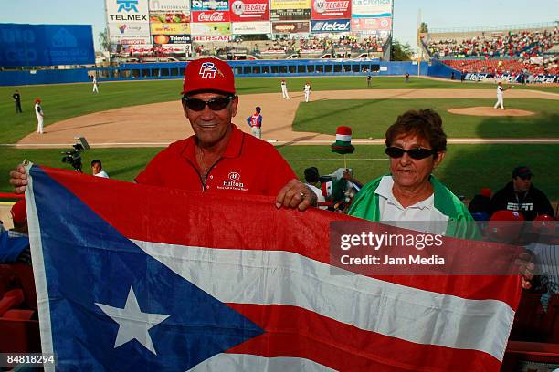 Fans of Puerto Rico hold the National Flag during the game between Costa Rica against Dominican Republic in the Caribbean series 2009 on February 3,...