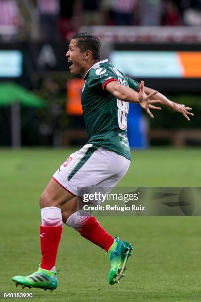 Jesus Godinez of Chivas celebrates after scoring the first goal of his team during the 9th round match between Chivas and Pumas UNAM as part of the...