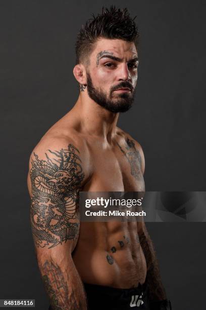 Mike Perry poses for a post fight portrait backstage during the UFC Fight Night event inside the PPG Paints Arena on September 16, 2017 in...