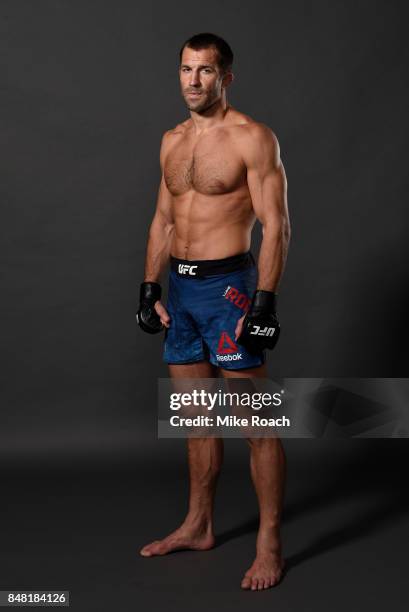 Luke Rockhold poses for a post fight portrait backstage during the UFC Fight Night event inside the PPG Paints Arena on September 16, 2017 in...
