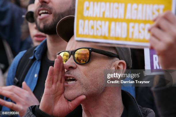 Protester from the left wing taunts those on the right on September 17, 2017 in Melbourne, Australia. Left-wing group Campaign Against Racism and...