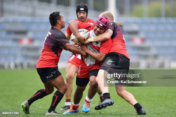 David Toetu of Counties Manukau is tackled during the NZ Rugby League Premiership round one match between the Canterbury Bulls and the Counties...