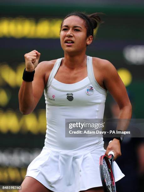 Great Britain's Heather Watson celebrates against Czech Republic's Iveta Benesova during day one of the 2012 Wimbledon Championships at the All...