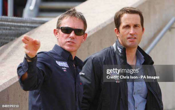British Olympic triple gold medal winning sailor Ben Ainslie and Squad Manager Stephen Park during a visit by the Prince of Wales, to the Weymouth...