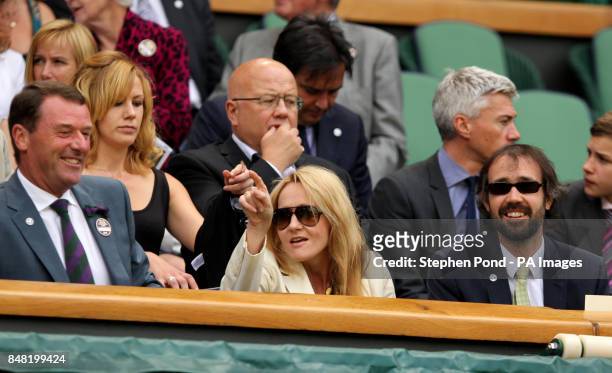 Author J.K Rowling with Wimbledon chairman Philip Brook and husband Neil Murray in the royal box.