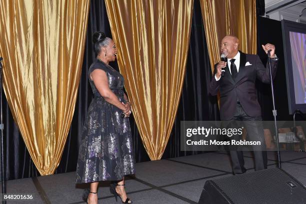 Recording artist Regina Belle and recording artist Peabo Bryson perform at the 2017 DMF Care for Congo Gala at St. Regis Hotel on September 16, 2017...