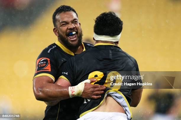 Mateaki Kafatolu of Wellington congratulates Du'Plessis Kirifi on his try during the round five Mitre 10 Cup match between Wellington and Canterbury...