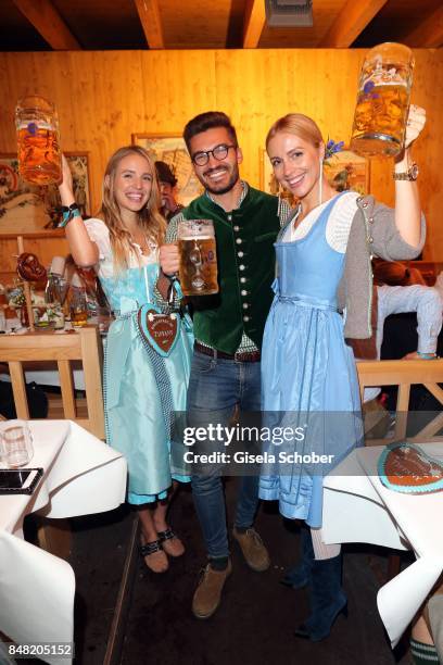 Leonia Hanne, Justus Hansen and Viktoria Rader during the 'Fruehstueck bei Tiffany' at Schuetzenfesthalle at the Oktoberfest on September 16, 2017 in...