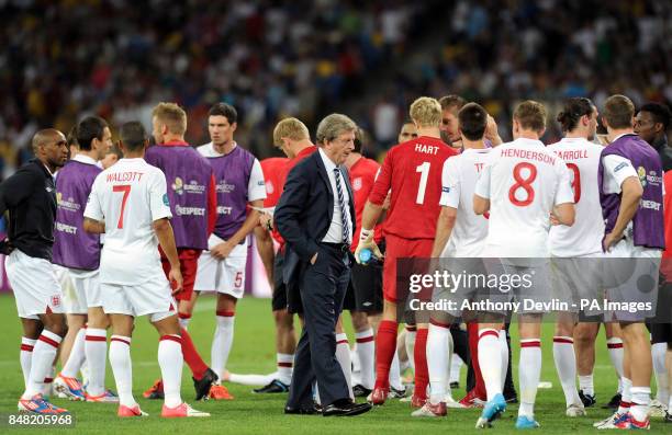 England Head Coach Roy Hodgson with the players before the penalty shoot out