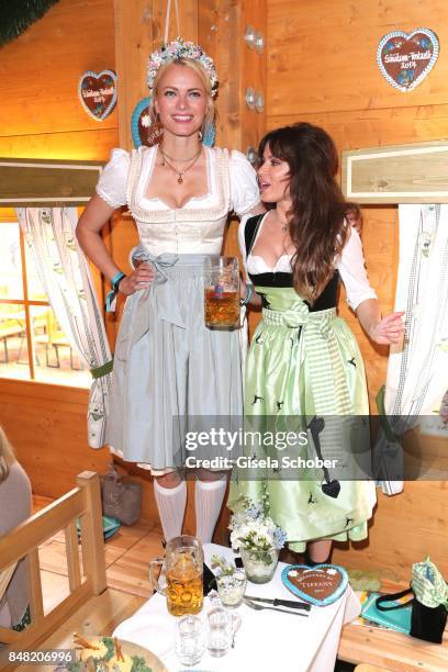 Franziska Knuppe and Natalia Avelon during the 'Fruehstueck bei Tiffany' at Schuetzenfesthalle at the Oktoberfest on September 16, 2017 in Munich,...