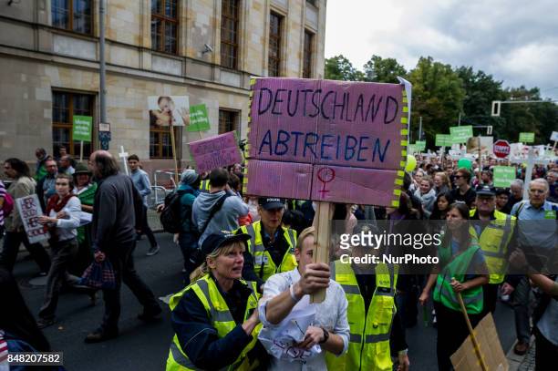 Counter-demonstant is discharged by the police in Berlin, Germany, on 16 September 2017. Under the motto &quot;Protect the most vulnerable, yes to...