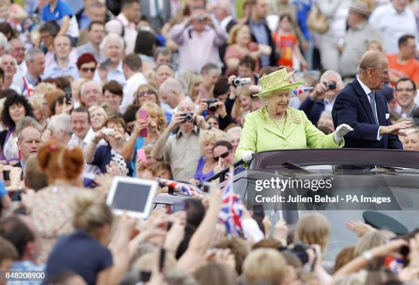 Queen Elizabeth II and the Duke of Edinburgh tour the grounds of Stormont in Belfast, during a two-day visit to Northern Ireland as part of the...