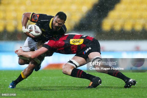 Mateaki Kafatolu of Wellington is tackled by Mitchell Dunshea of Canterbury during the round five Mitre 10 Cup match between Wellington and...