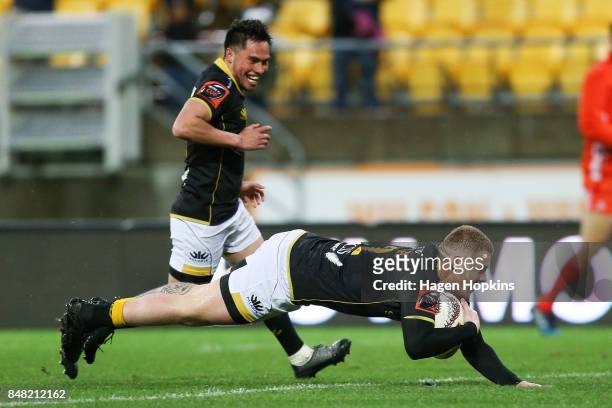 Regan Verney of Wellington scores a try while Sheridan Rangihuna looks on during the round five Mitre 10 Cup match between Wellington and Canterbury...
