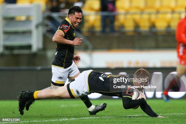 Regan Verney of Wellington scores a try while Sheridan Rangihuna looks on during the round five Mitre 10 Cup match between Wellington and Canterbury...