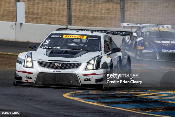 The Cadillac ATS-V.R of Johnny O'Connell trails smoke after making contact wth another car during the GoPro Grand Prix of Sonoma Pirelli World...