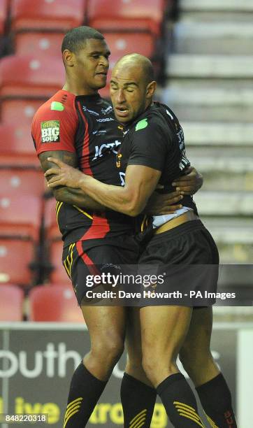 Bradford Bulls Karl Pryce and Chev Walker celebrate their fifth try during the Stobart Super League match at the DW Stadium, Wigan.