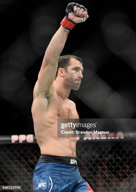 Luke Rockhold enters the Octagon before facing David Branch in their middleweight bout during the UFC Fight Night event inside the PPG Paints Arena...