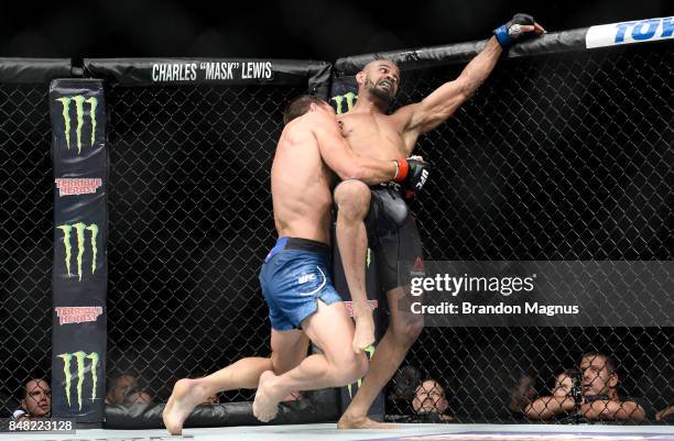 Luke Rockhold takes down David Branch in their middleweight bout during the UFC Fight Night event inside the PPG Paints Arena on September 16, 2017...