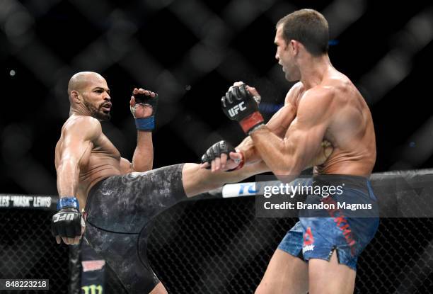 David Branch kicks Luke Rockhold in their middleweight bout during the UFC Fight Night event inside the PPG Paints Arena on September 16, 2017 in...