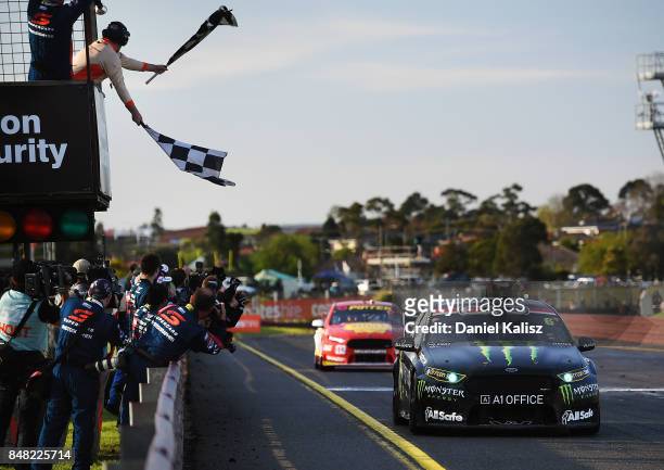 Race winner Cameron Waters drives the Monster Energy Ford Falcon FGX takes the chequred flag to win the Sandown 500, which is part of the Supercars...