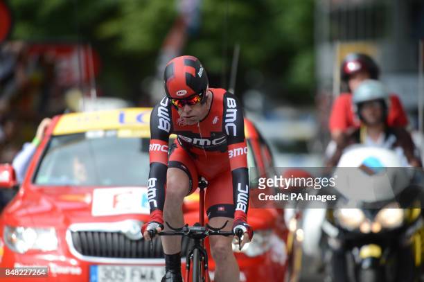 S Cadel Evans crosses the finish line during the Prologue Stage of the 2012 Tour de France in Liege, Belgium.