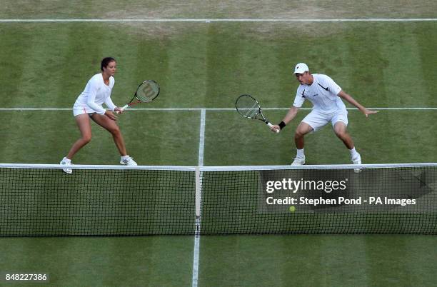 Great Britain's doubles pair of Laura Robson and Dominic Inglot in action against Austria's Jurgen Melzer and Czech Republic's Iveta Benesova during...