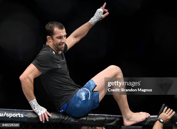 Luke Rockhold celebrates his victory over David Branch in their middleweight bout during the UFC Fight Night event inside the PPG Paints Arena on...