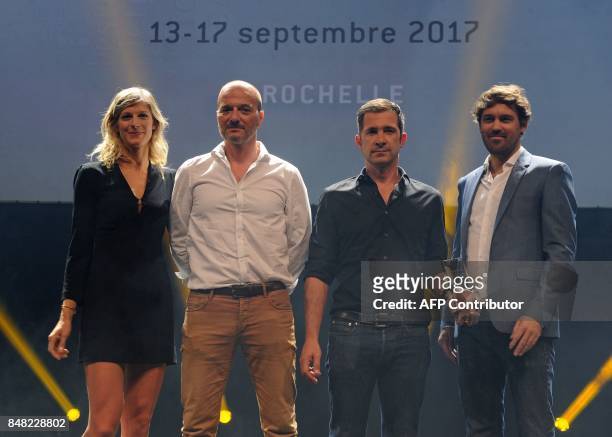 French actress Alexia Barlier and crew members of the TV film "La foret" pose after receiving the best serie 52' award during closing ceremony of the...