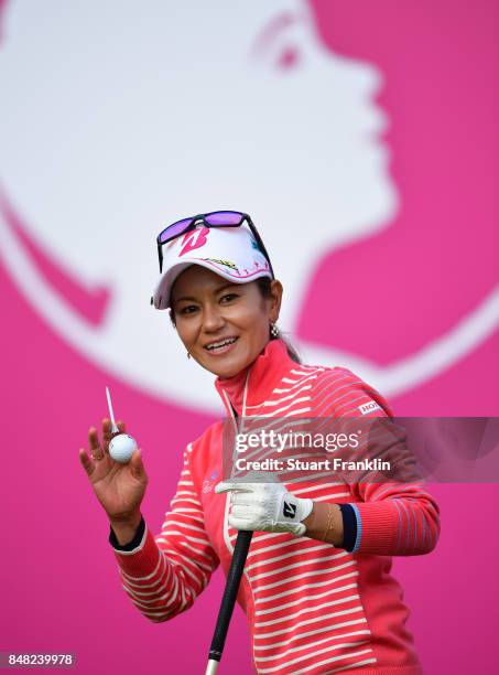 Ai Miyazato of Japan waves to fans as she starts her last competative round of golf during the final round of The Evian Championship at Evian Resort...