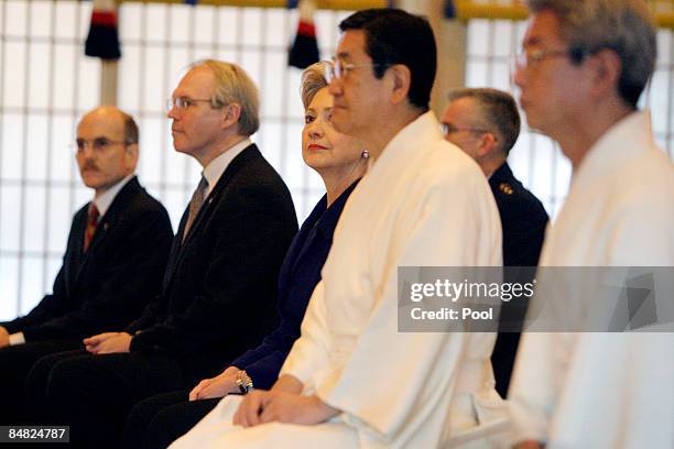 Secretary of State Hillary Clinton watches a cultural performance during a visit to the Meiji Shrine on February 17, 2009 in Tokyo, Japan. Clinton is...