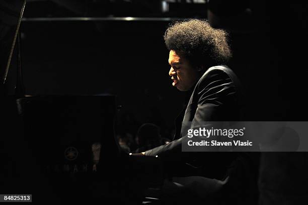Pianist Eric Lewis performs at the Donna Karan Collection Fall 2009 fashion show during Mercedes-Benz Fashion Week at 711 Greenwich Street on...