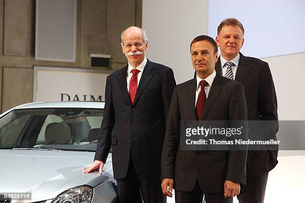 The Daimler Board of Directors Andreas Renschler , Bodo Uebber and CEO of Daimler AG, Dieter Zetsche pose for the media during annual press...