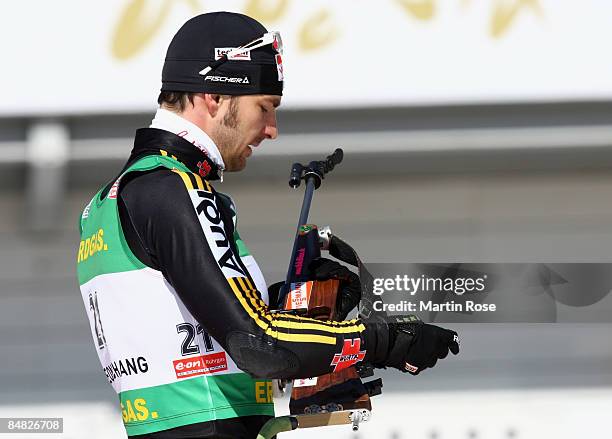 Alexander Wolf of Germany prepairs to shoot during the Mens's 20 km individual of the IBU Biathlon World Championships on February 17, 2009 in...