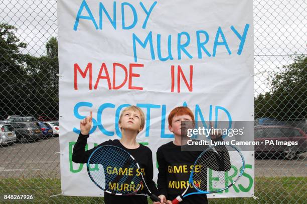 Dunblane Tennis Club members Finlay Sherriff 7 and Sean Balman 8, both from Dunblane, strike the Andy Murray celebration pose, as the streets in Andy...