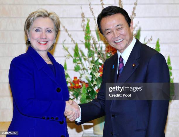 State Secretary Hillary Clinton chats with Japanese Prime Minister Taro Aso prior to their talks at Aso's official residence on February 17, 2009 in...