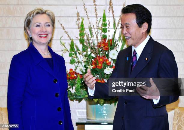 State Secretary Hillary Clinton chats with Japanese Prime Minister Taro Aso prior to their talks at Aso's official residence on February 17, 2009 in...