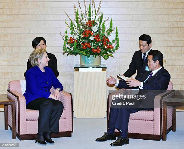 State Secretary Hillary Clinton chats with Japanese Prime Minister Taro Aso prior to their talks at Aso's official residence on February 17, 2009 in...