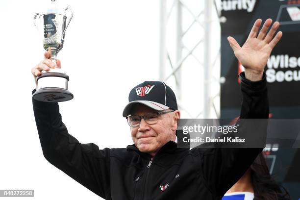 Former Australian Touring Car Champion Allan Moffat reacts on the podium after the Sandown 500, which is part of the Supercars Championship at...