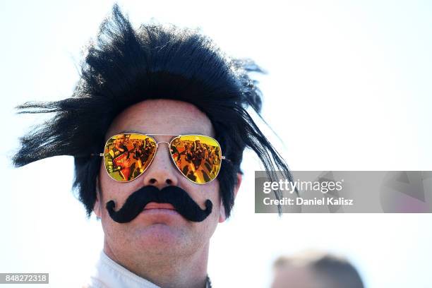 Craig Lowndes driver of the TeamVortex Holden Commodore VF looks on during the Sandown 500, which is part of the Supercars Championship at Sandown...