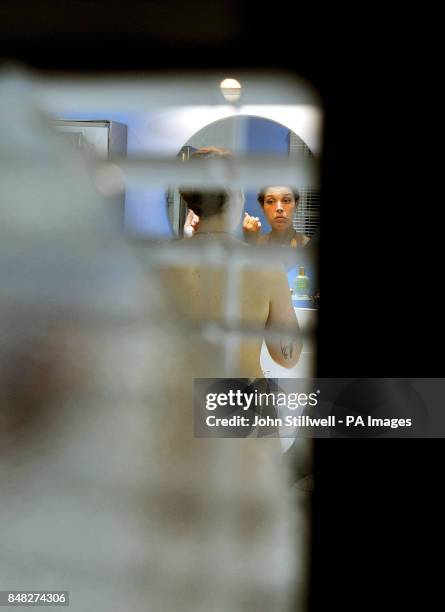 View through a peephole of Diana in the bathroom by British Artist Mark Wallinger, that responds to the work of the artist Titian's paintings titled...