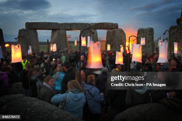 Fires light up the ancient stones at Stonehenge near Salisbury, Wiltshire as French artists Compagnie Carabosse present Fire Garden for the Salisbury...