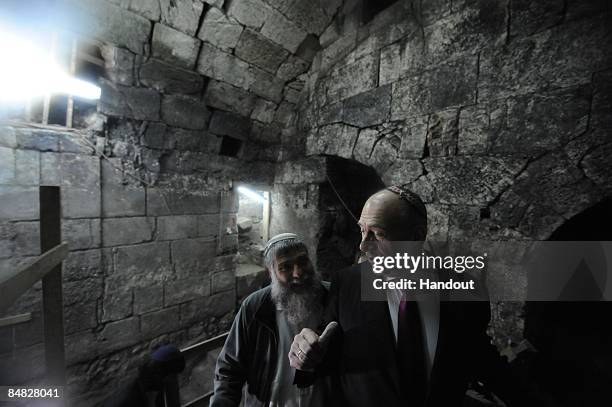 Israeli Prime Minister Ehud Olmert is given a tour of the archeological excavations at the Western Wall in the Old City on February 17, 2009 in...